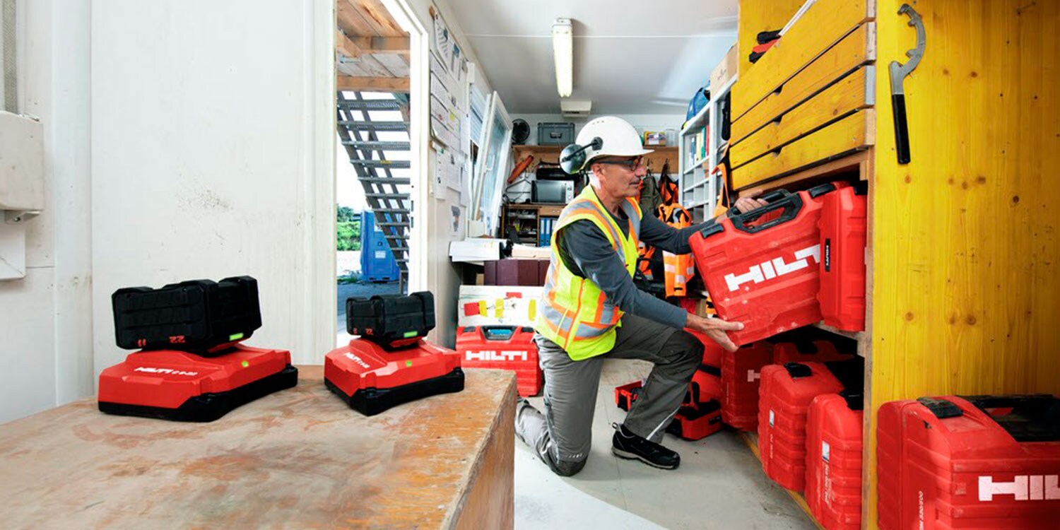 Foreman putting away his fleet of tools