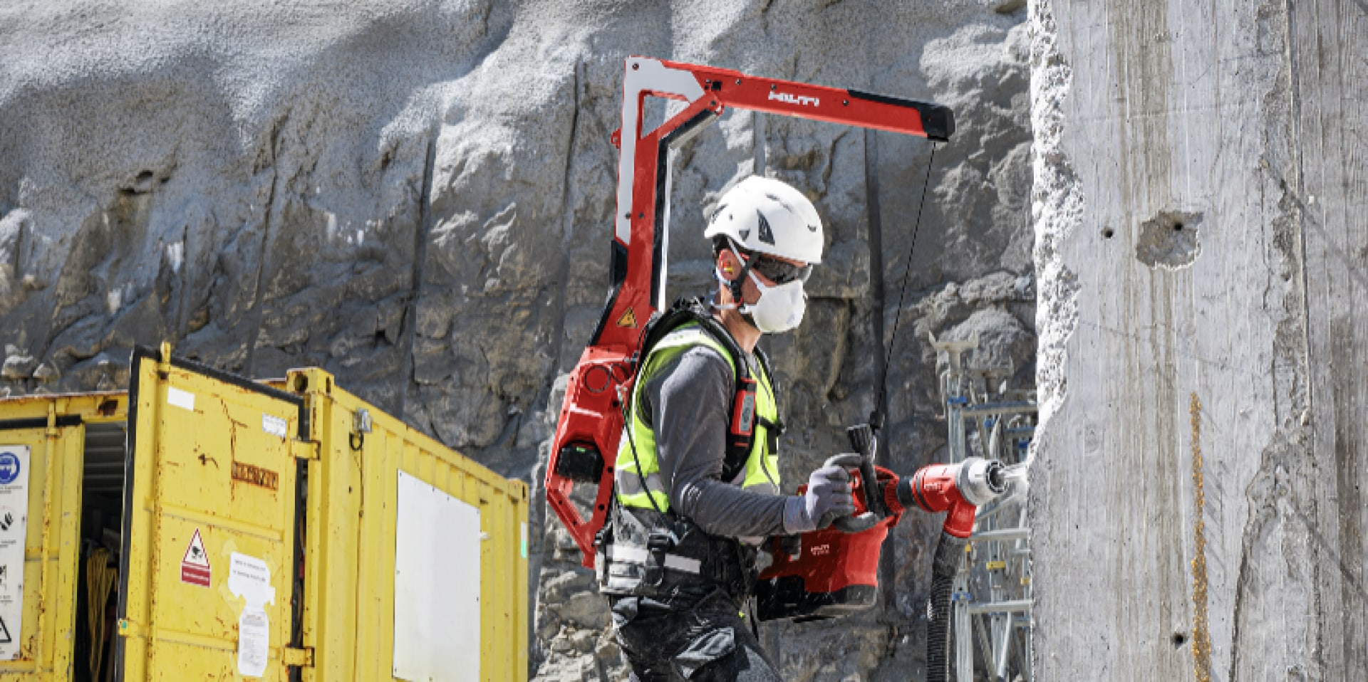 Worker chiseling rock more easily with the EXO-T-22