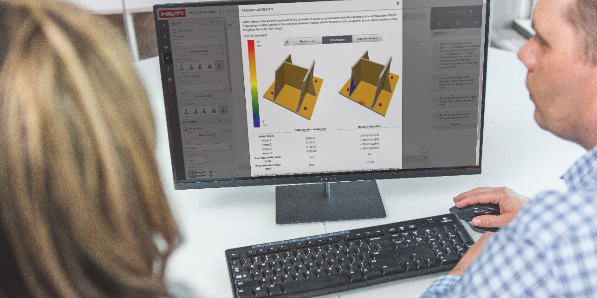 2 people working with Hilti design software infront of a screen