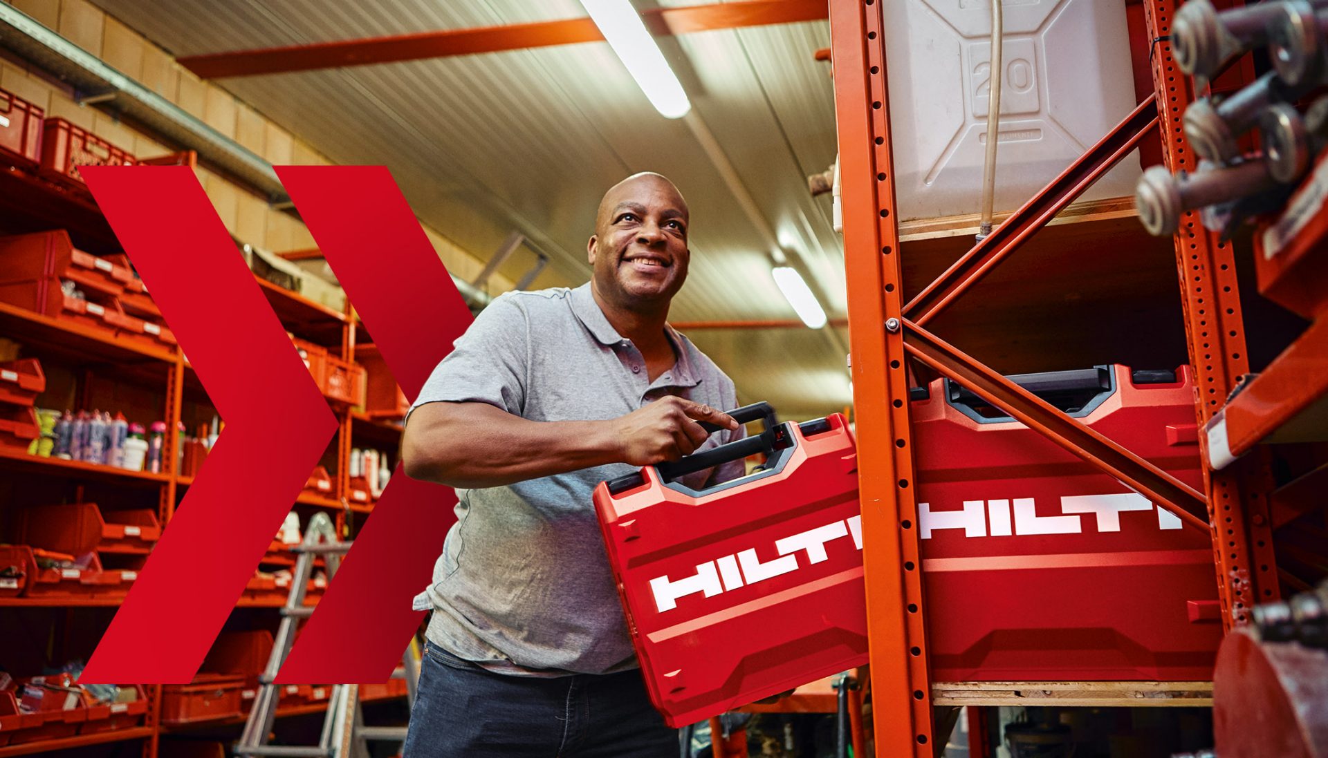 Tool Crib Manager putting away a Hilti Tool Box on a shelf in the warehouse
