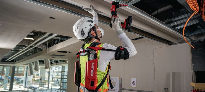 Exosquelette d'épaules large EXO-S Exosquelette pour les métiers de la construction. A porter pour soulager la fatigue des épaules et du cou lors des applications au-dessus du niveau des épaules, pour des circonférences de bicep supérieures à 40 cm (16”). Applications 1