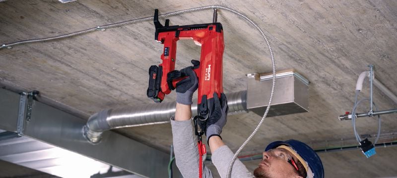 Cloueuse pour béton sans fil BX 3-ME-22 (édition M&E) Outil de fixation alimenté par batterie Nuron pour la pose des câbles, des conduits et des goujons filetés dans le béton, l’acier et la maçonnerie (longueur max. des clous 24 mm │ 15/16 po) Applications 1